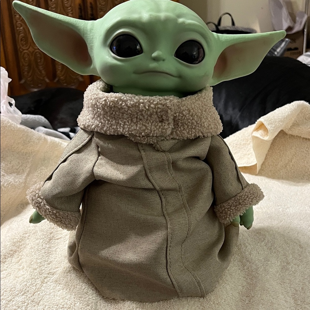 Mattel Star Wars Green and Tan Baby Yoda Beanbag Figurine.